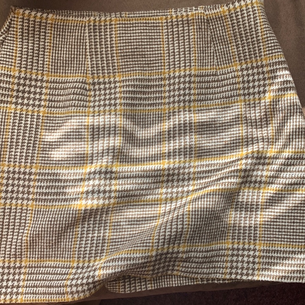a cream mustard skirt